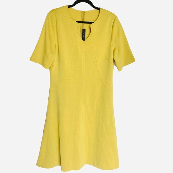 St. John Dresses & Skirts - St. John Caris Knit Dress With Oval Neckline.